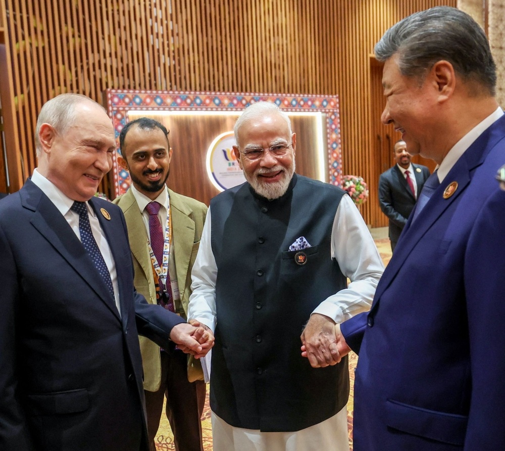 Six years after border clash, Modi and Xi talk peace and trade at Brics summit