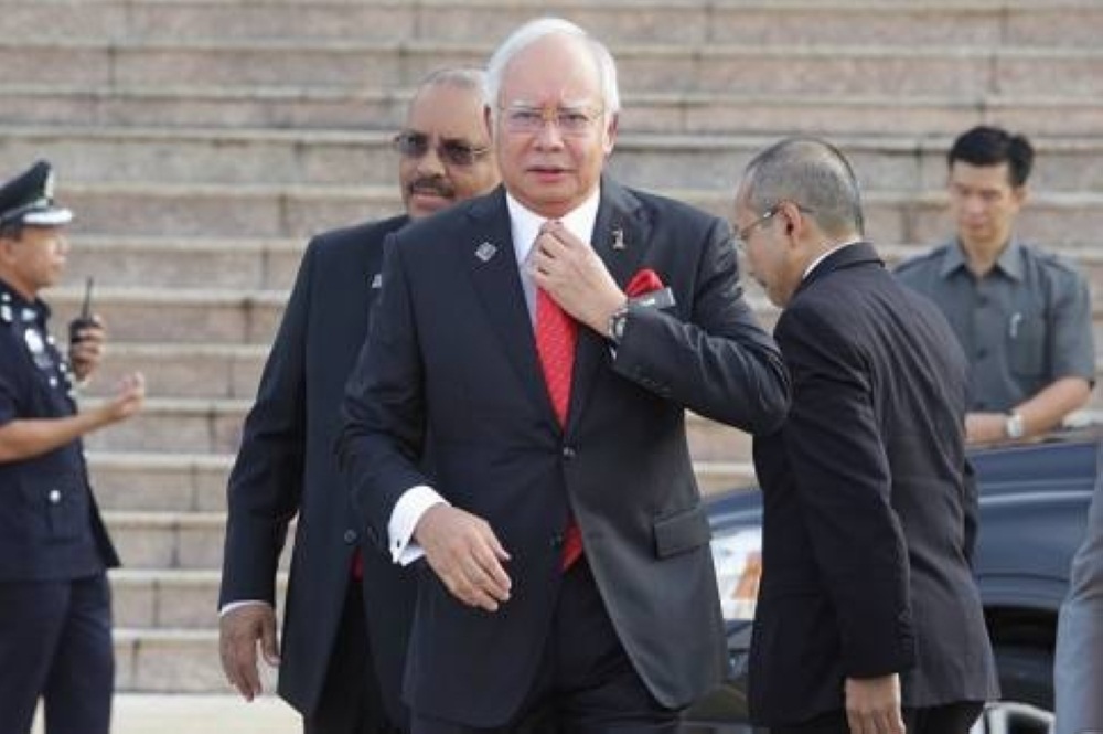 Even unfrozen assets won’t immediately cover Najib’s RM50m house-arrest fine, says son