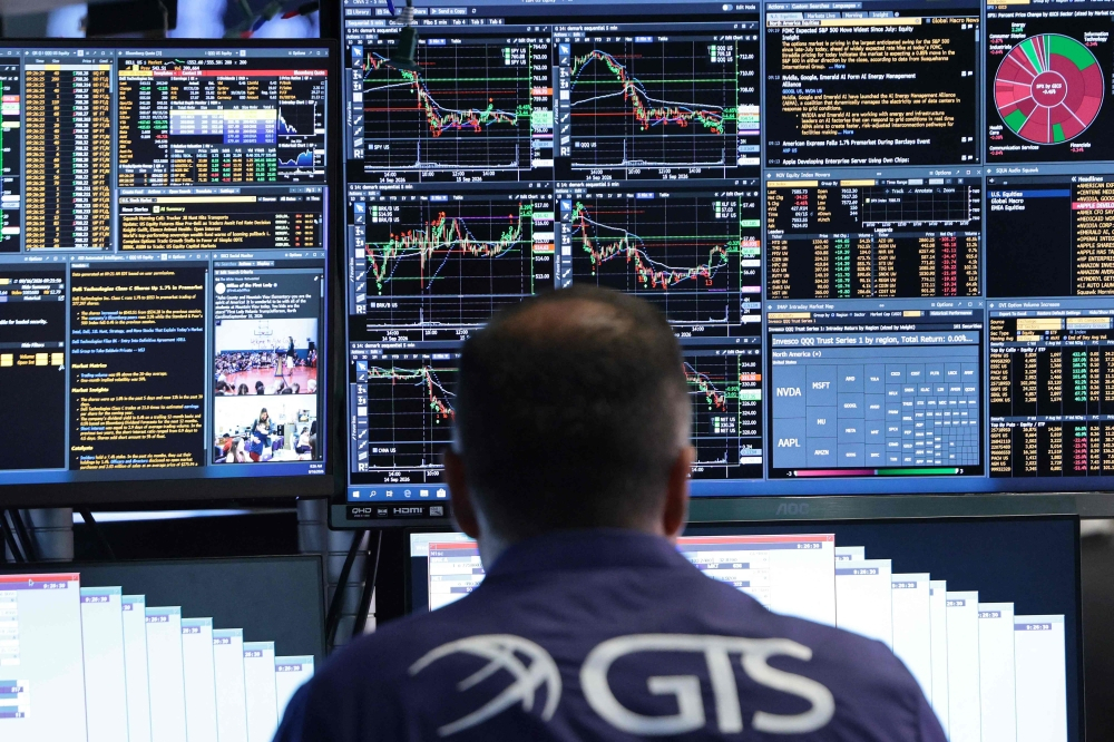 Global markets surge as oil prices fall, US-China trade hopes grow