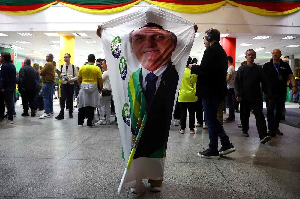 Flavio Bolsonaro beats Lula in surprise Brazil election result, run-off set for Oct 25
