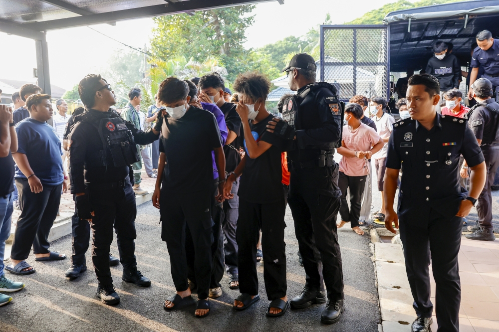 Teenagers among 14 charged in Gurun murder, victim allegedly tortured before body found near golf club