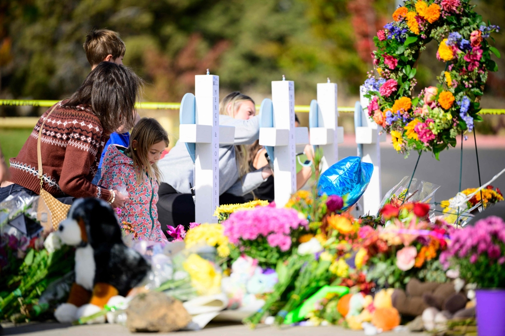 ‘Why did this happen?’ Oregon families help children cope after school shooting
