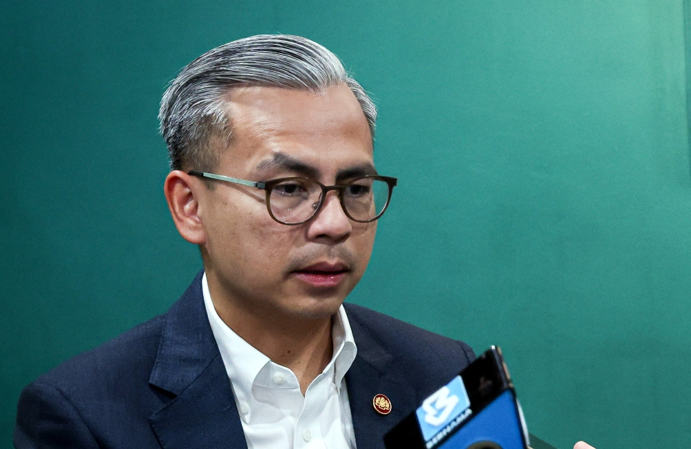 Fahmi condemns cyberbullying of UM student Ummi after she questioned Najib fine donations