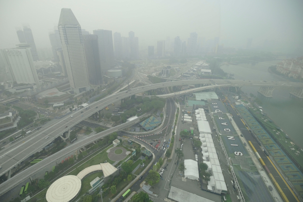 Indonesian paper company hit with restrictions in Singapore after suppliers linked to haze fires